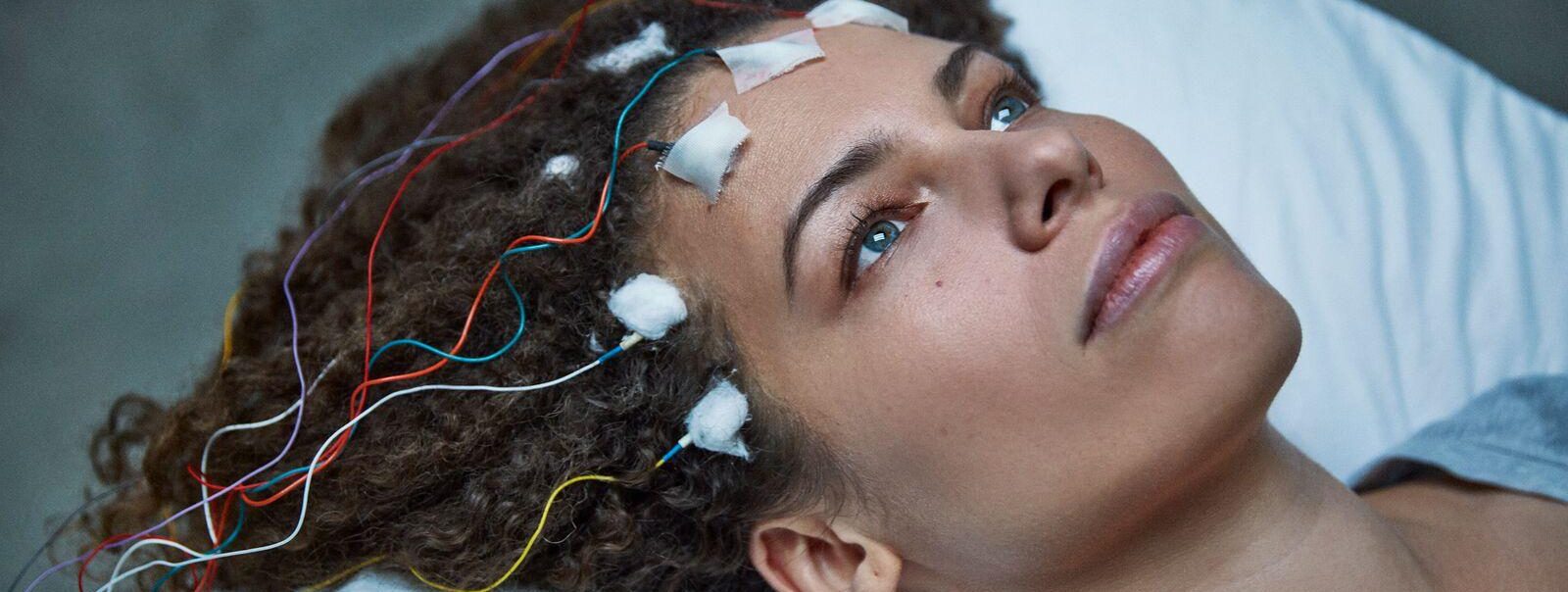 Unrest Image With EEG plugs to head